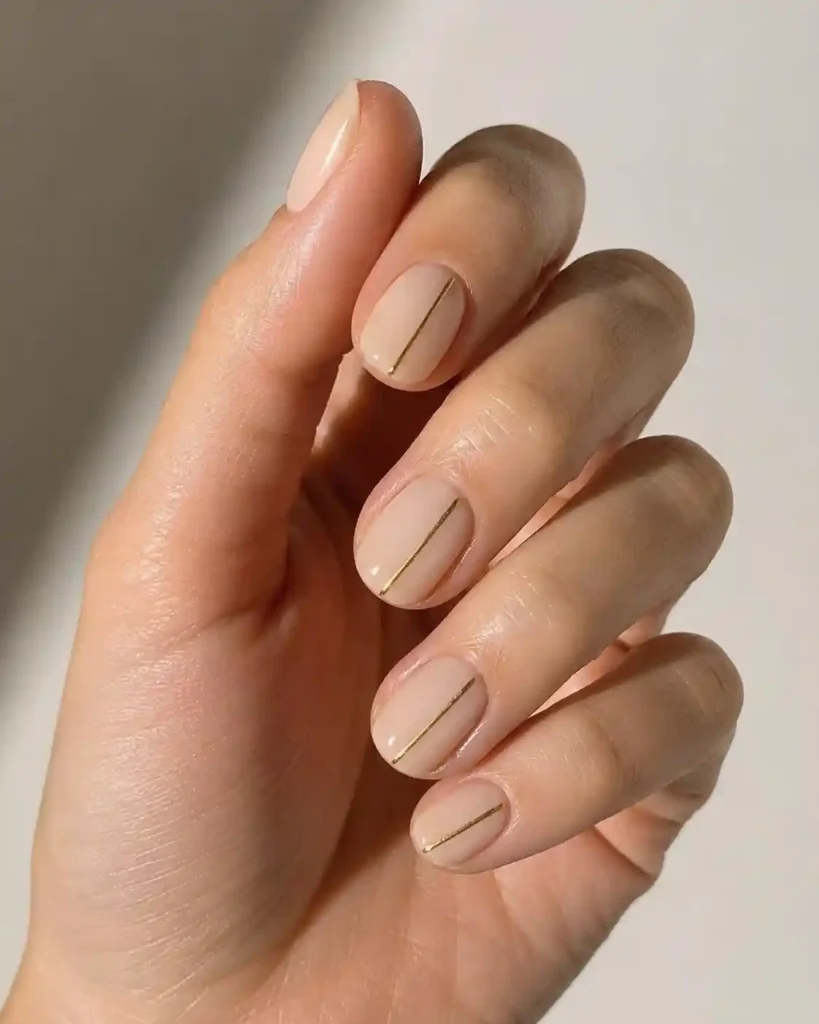 Nude with Delicate Gold Line Nails